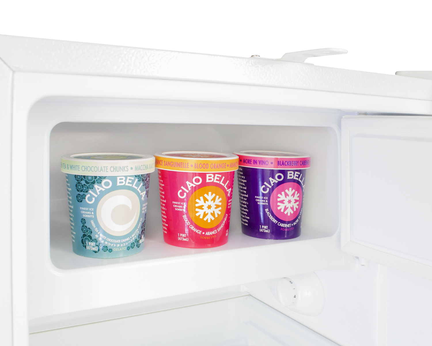 Built-in undercounter ADA compliant refrigerator-freezer in white with reversible SS door and vertical handle for residential use, manual defrost with glass shelves, front lock, and door storage